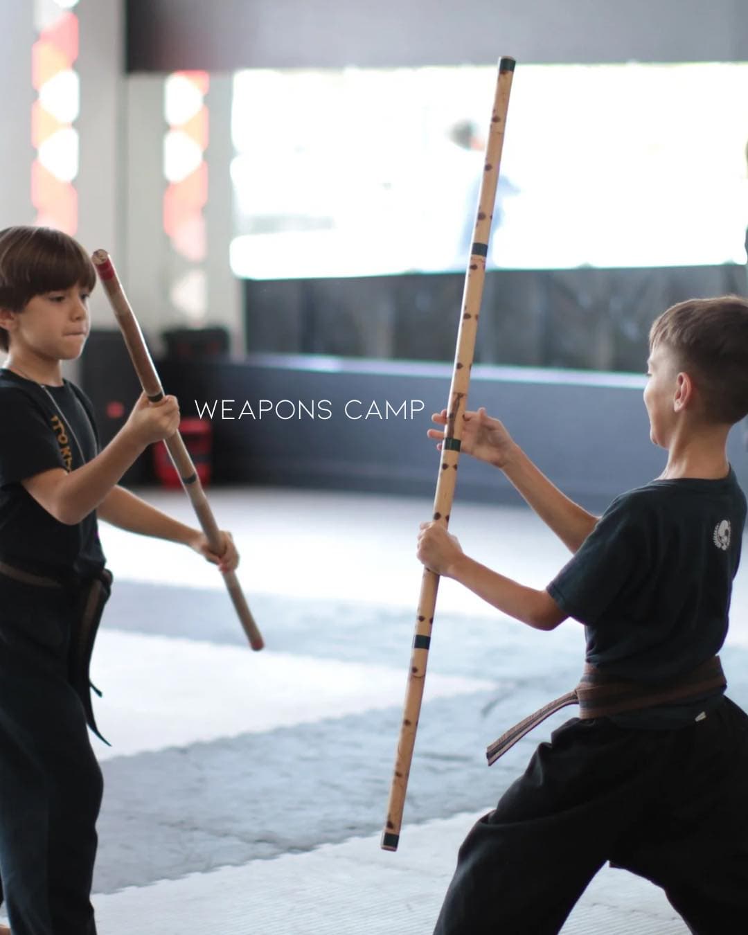 Students practicing weapons technique at KJMS Rogers Ranch